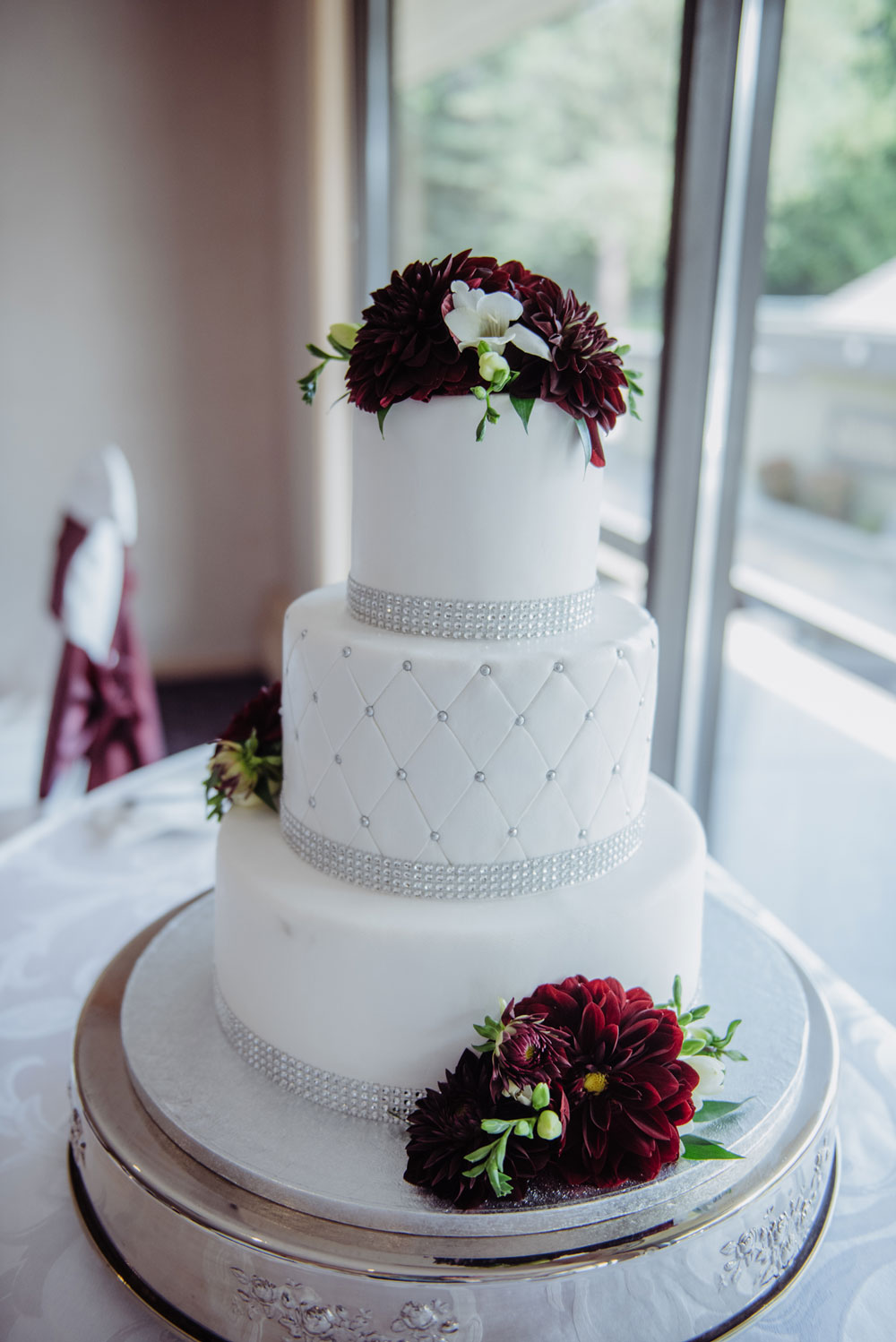 cake-3 Wedding cake with white fondant and edible floral arrangement